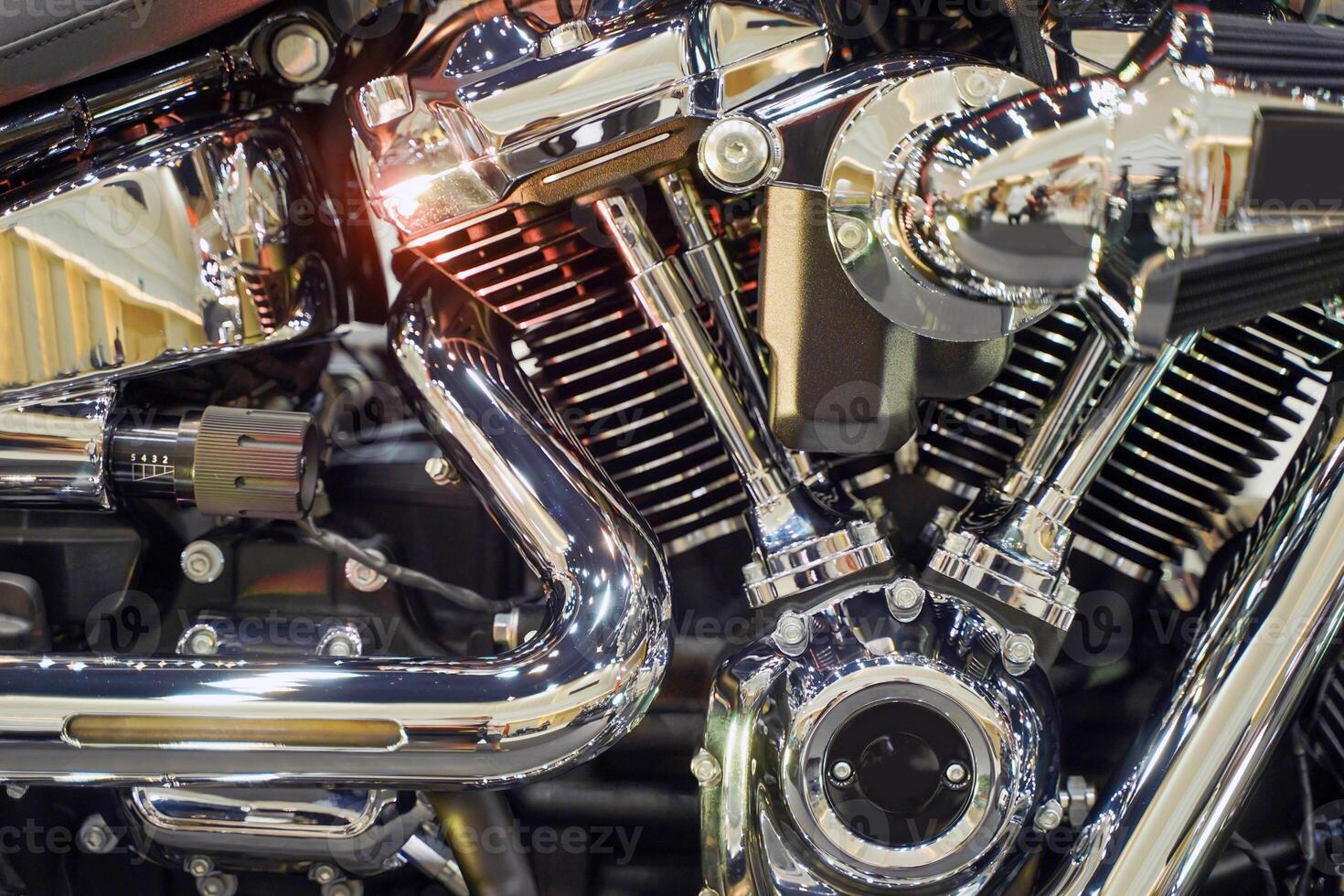 Closeup and crop engine of Chopper and cruise motorbike with chrome colors photo
