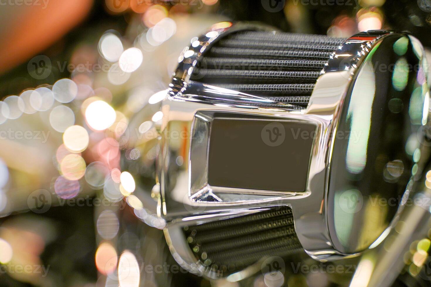 Closeup and crop air filter part of Chopper motorbike with chrome colors photo
