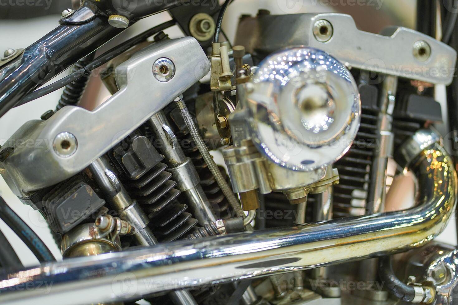 Closeup and crop old engine of 1970's Chopper motorbike in v type with chrome color photo