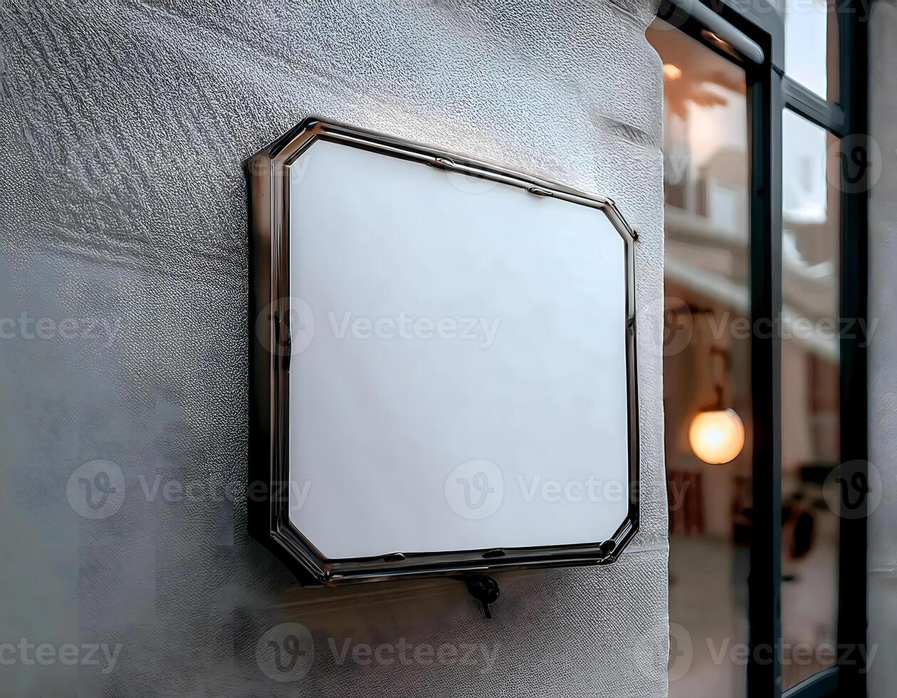 Closeup and perspective view of white blank square store signage design on store building photo