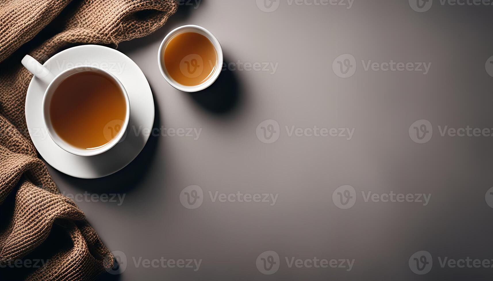 Two Cups of Tea on a Grey Background photo