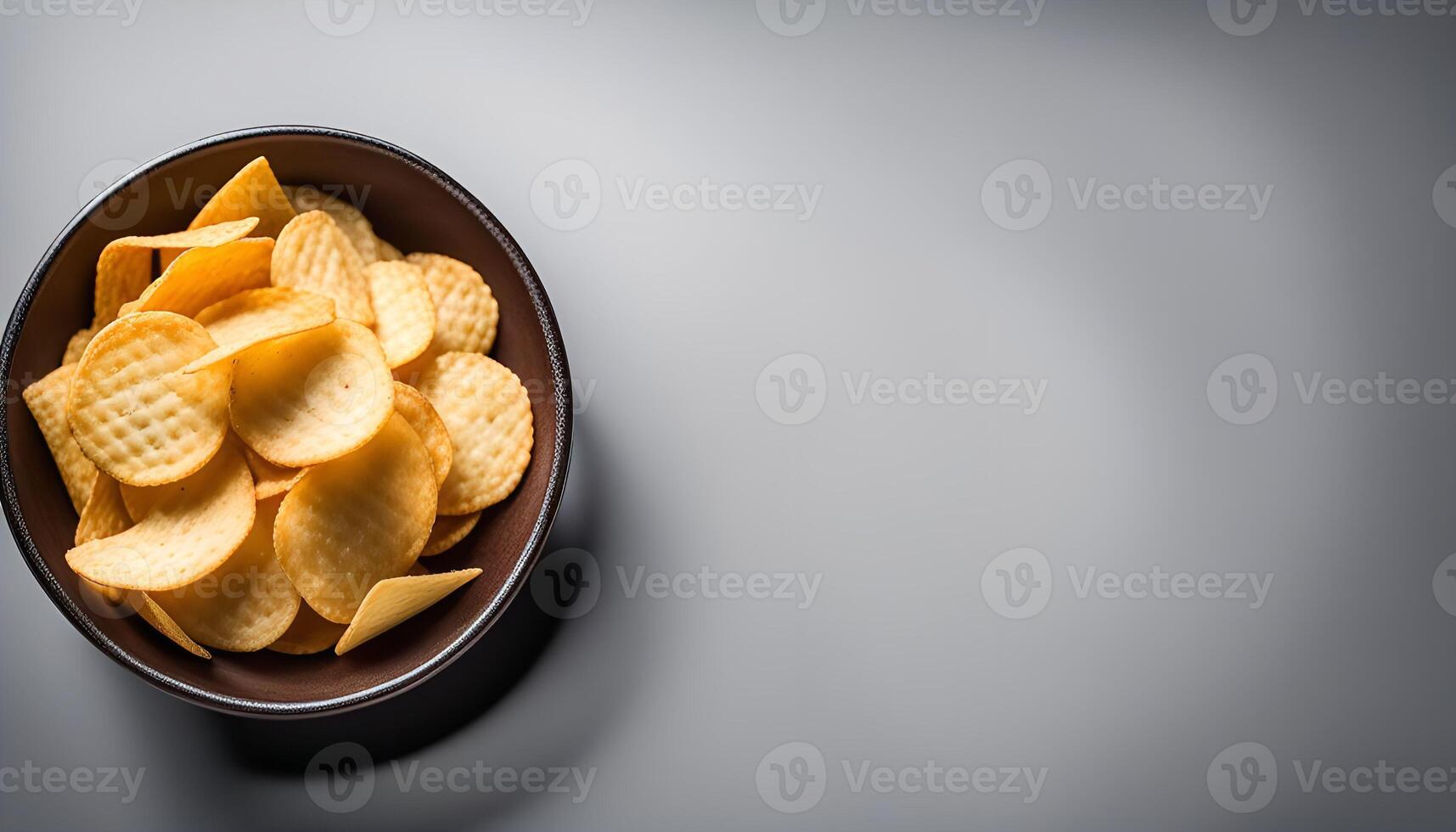 Crispy Potato Chips in a Bowl photo