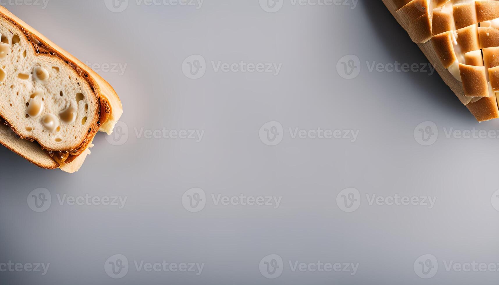 Two Slices of Bread with Filling on a Gray Background photo