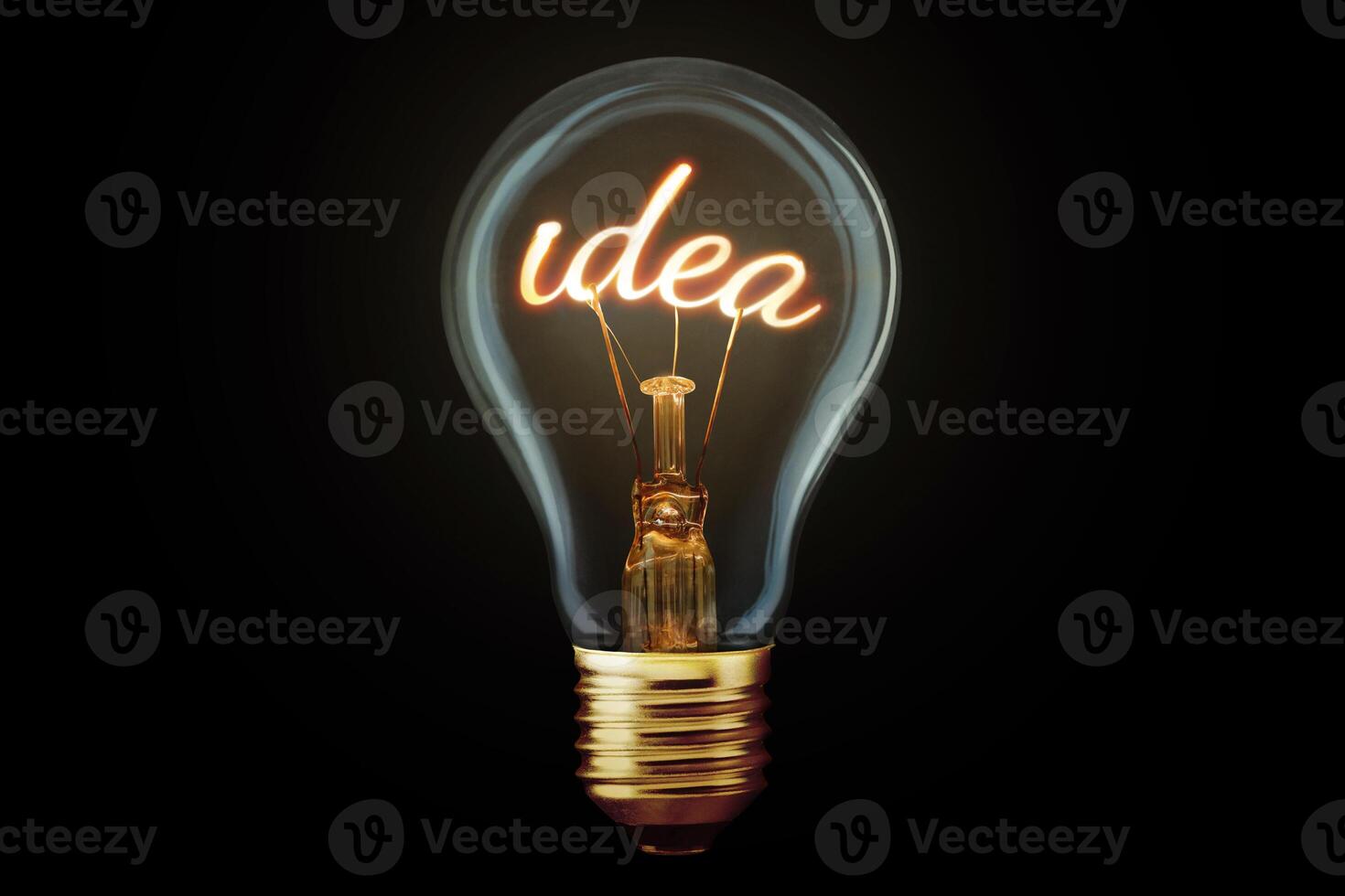 Creative light bulb with filament Idea glows on black background, concept. Think differently, creative idea. Marketing and generator of creative ideas. Creativity photo