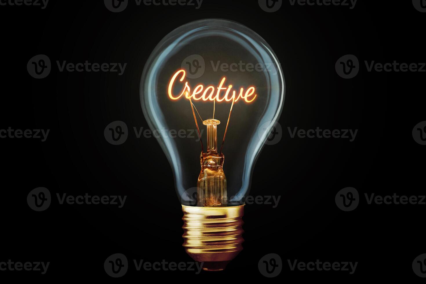 Creative light bulb with a spiral Creative glows on a black background, concept. Thought generator, creative idea. Think differently. Marketing. Growth and learning photo