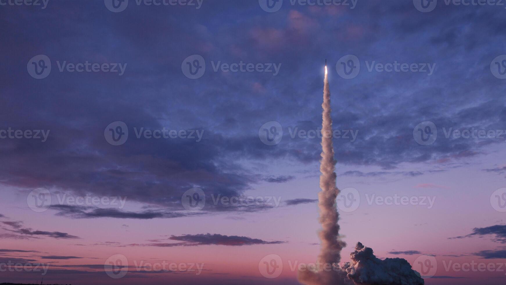 Space rocket with smoke and blast will successfully take off into the pink evening sky with clouds. Space mission and successful launch. Rocket lift off photo