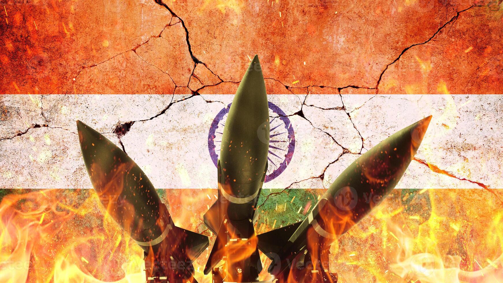 Rockets on fire against the backdrop of the Indian flag on a cracked concrete wall. War in India. Rockets weapons with fire on a black background, concept. War and death. World War 3. Nuclear War photo