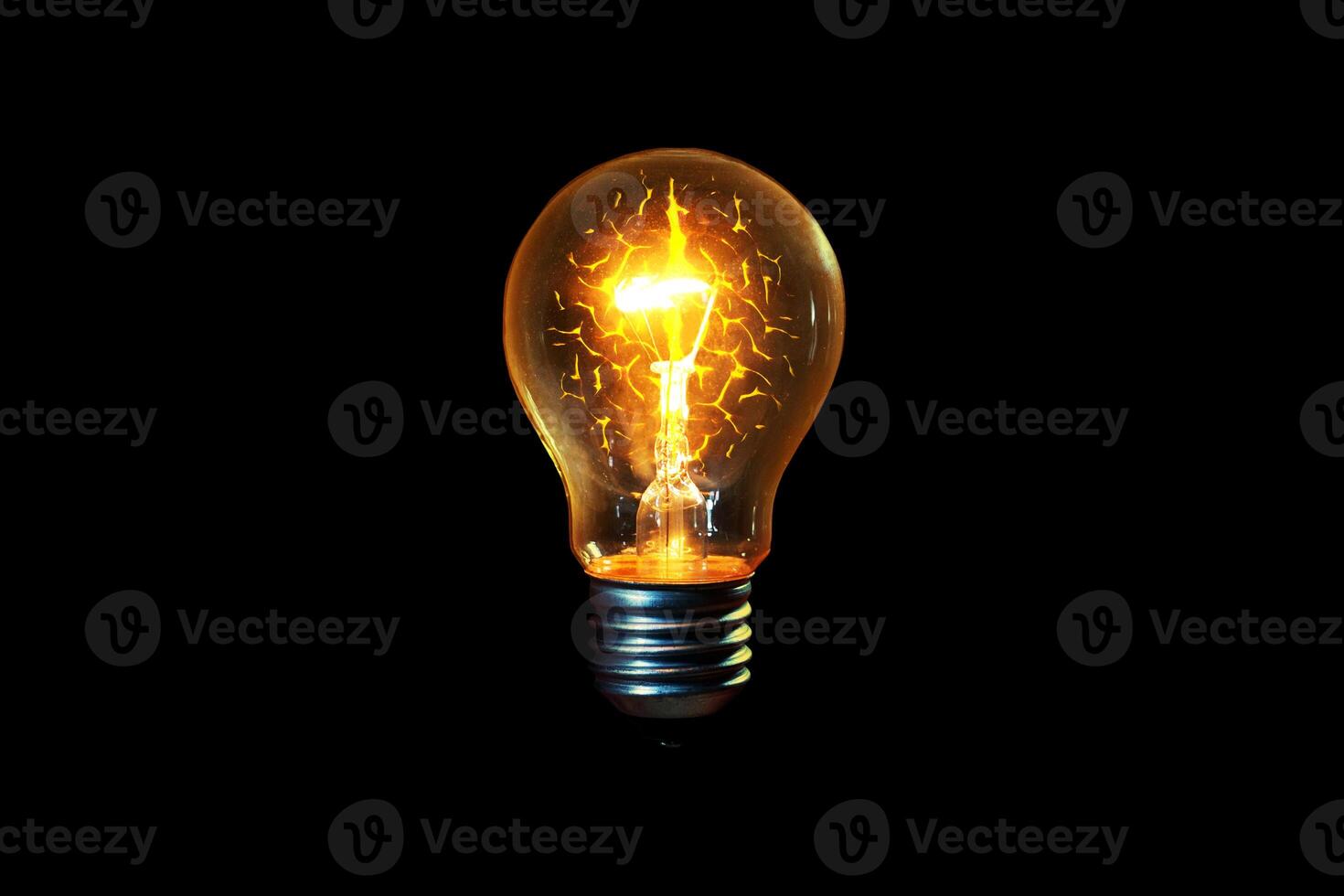 Creative light bulb glows with a brain on a black background, a creative idea. Thinking concept and brainstorm photo