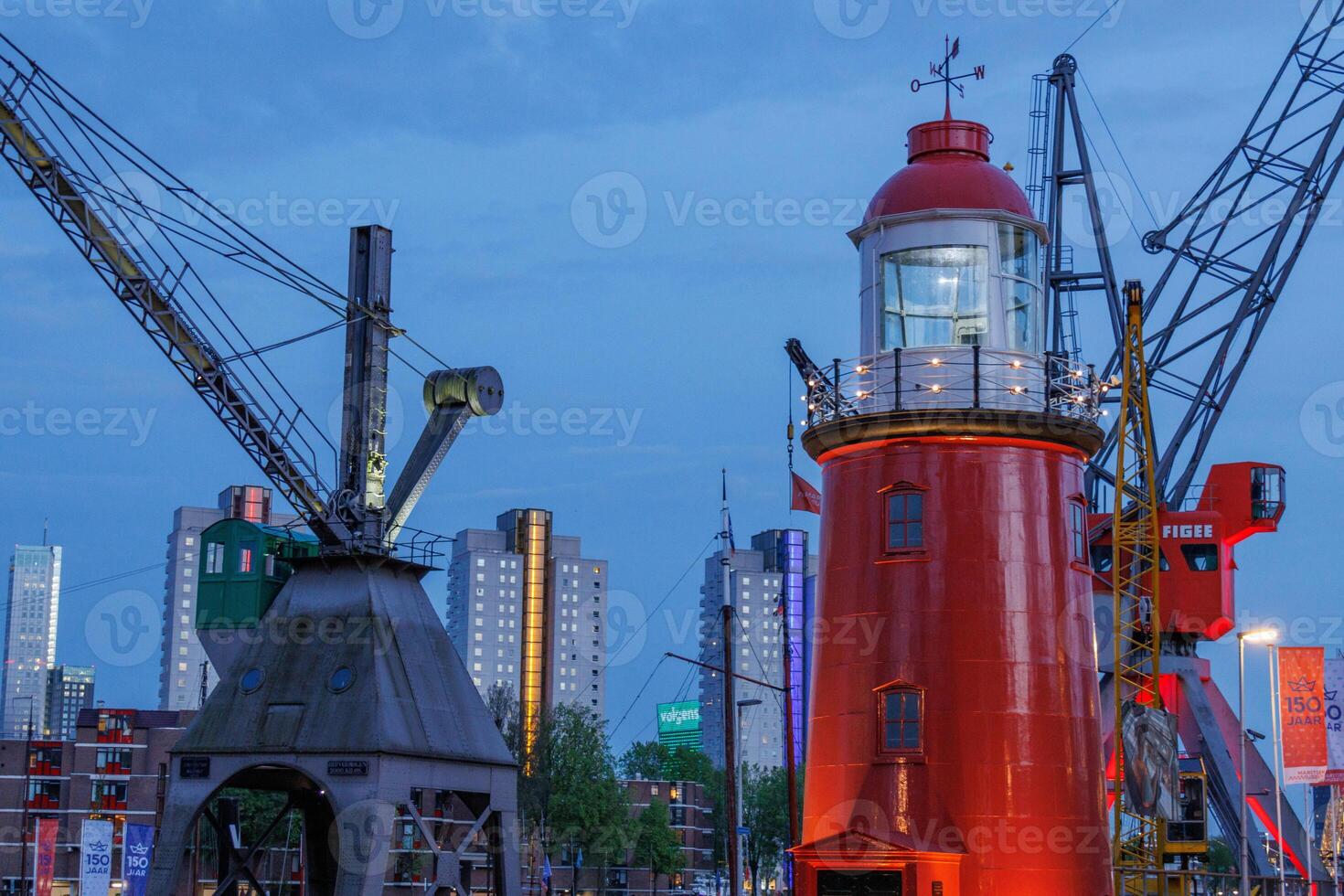A red lighthouse in rotterdam photo