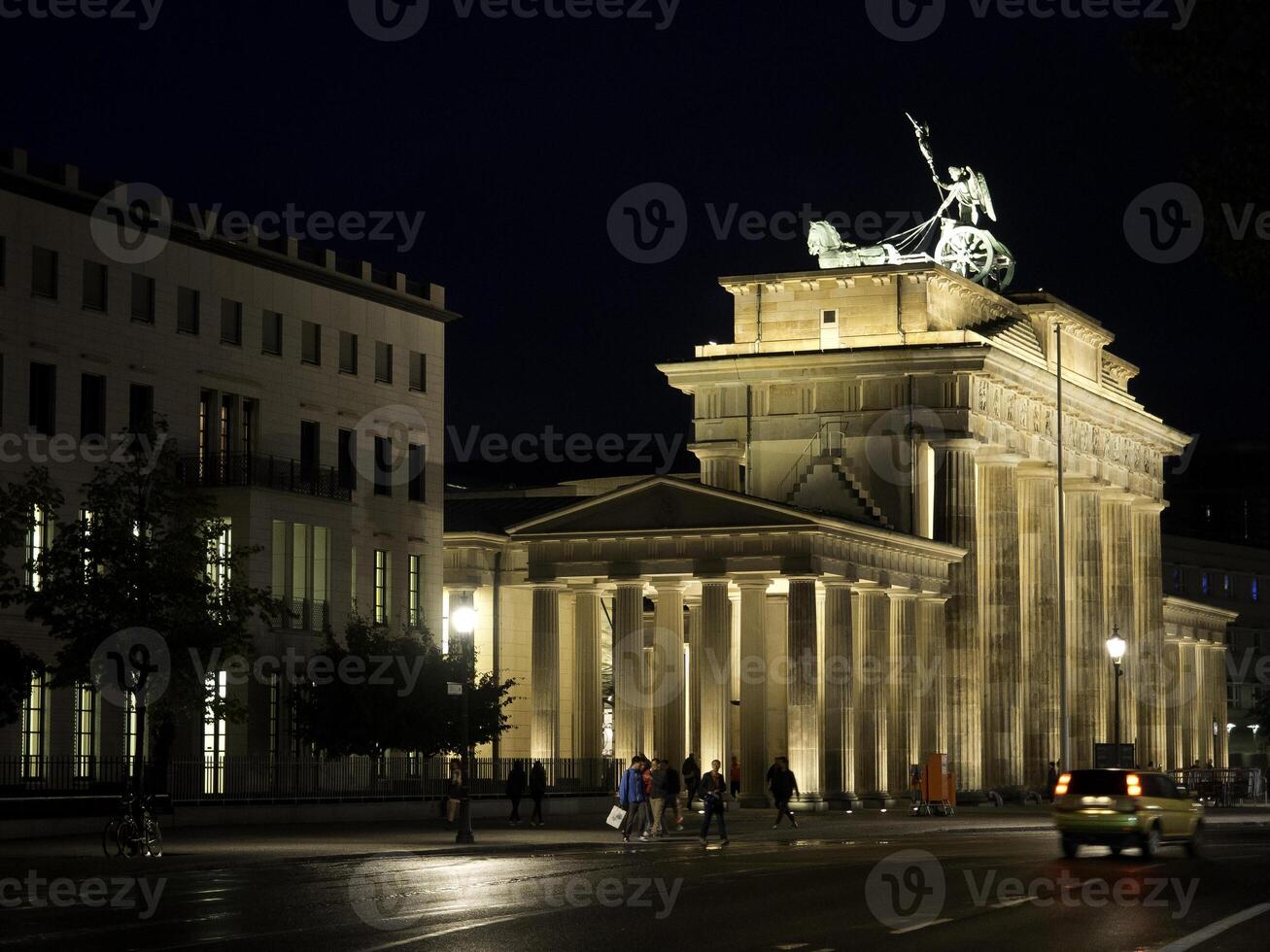 A building with a statue on top of it photo