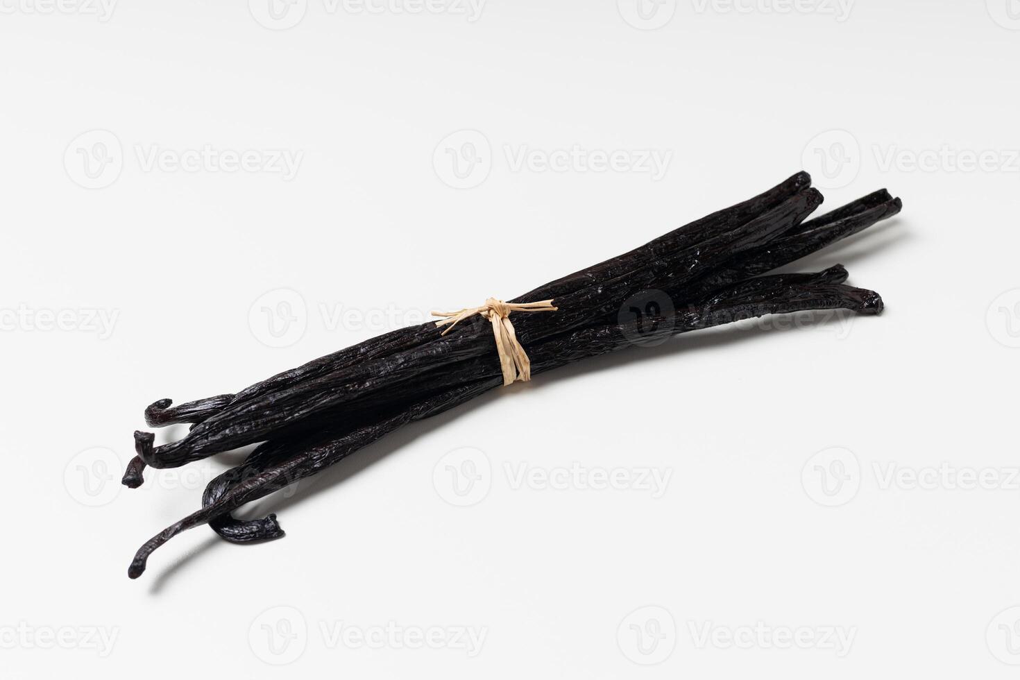Vanilla beans on white background photo