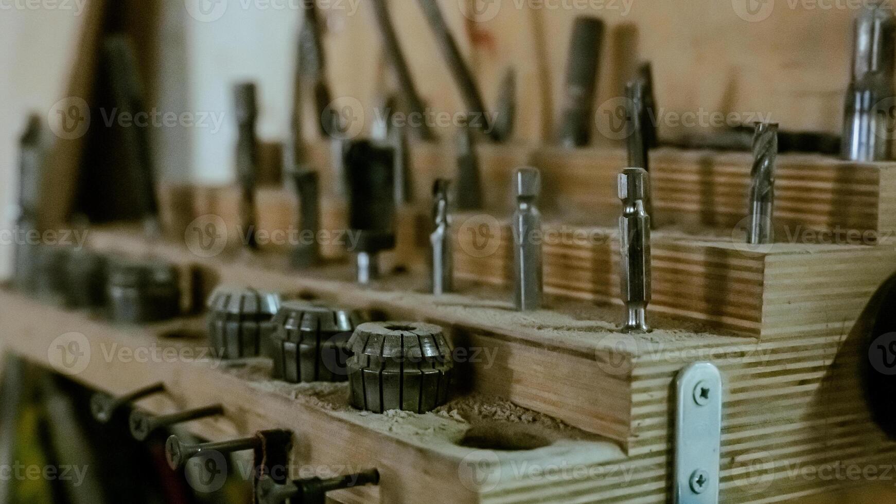 Various tools. file, screwdriver, hammer, pliers, garden tools are displayed on wooden shelf inside rustic garage or manufactory, workshop studio in a rustic garden house. Hobby, leasure activity. High quality photo