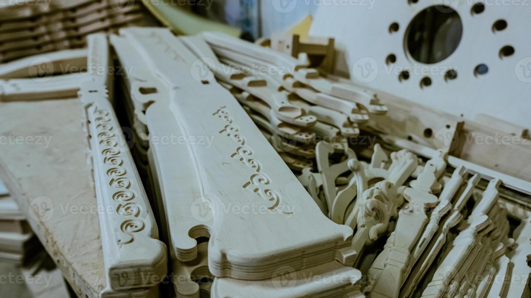 carving element. furniture in classic style. white color wood with gold trim. patina. carving. small depth of field. luxury furniture. use as background. High quality photo