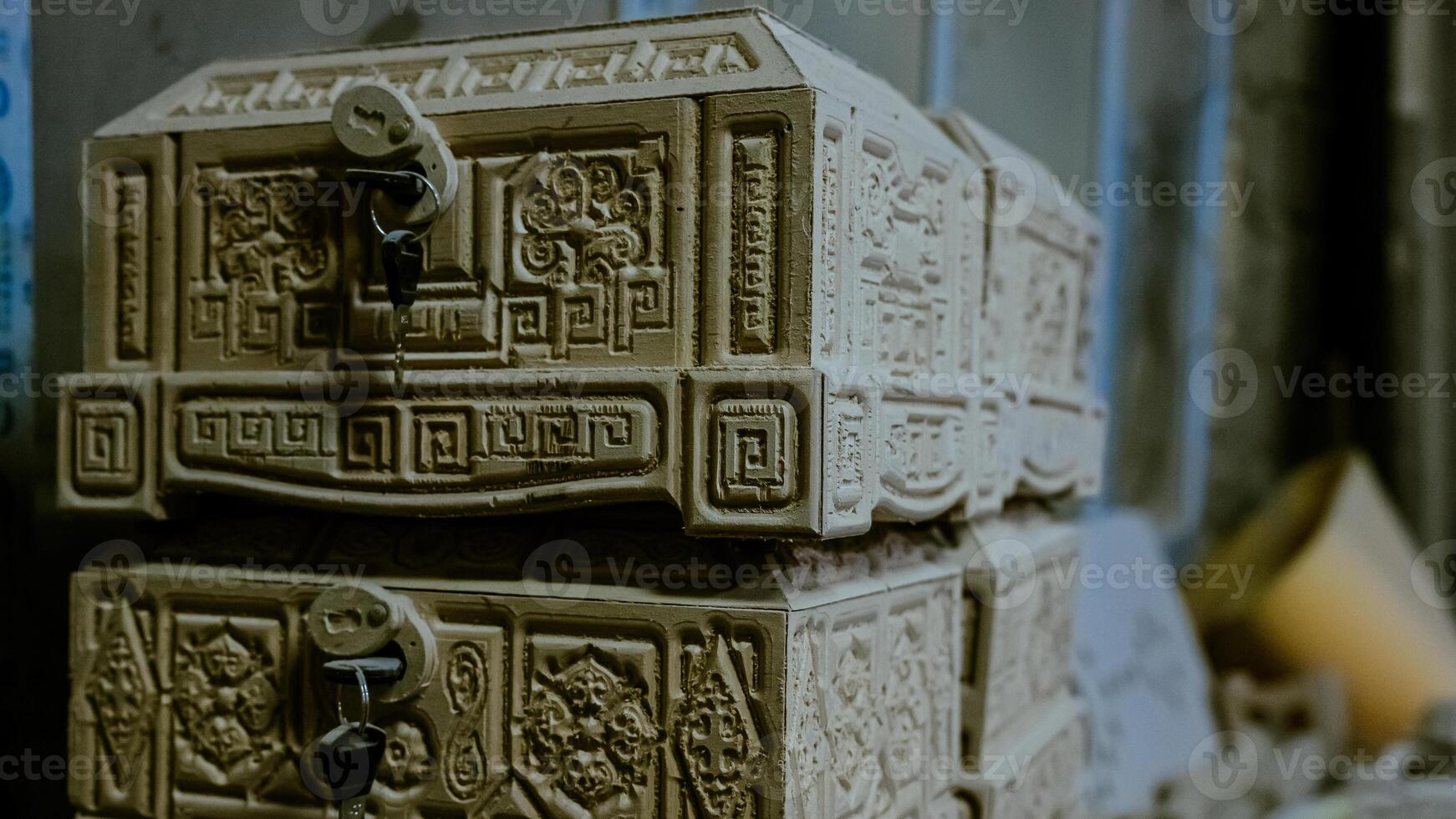 carving element. furniture in classic style. white color wood with gold trim. patina. carving. small depth of field. luxury furniture. use as background. High quality photo