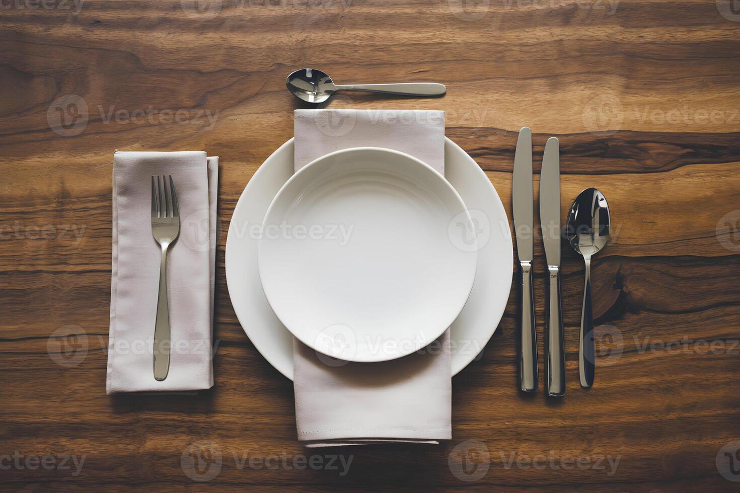 Minimalist dining table with white plate and silverware, elegant, clean arrangement photo