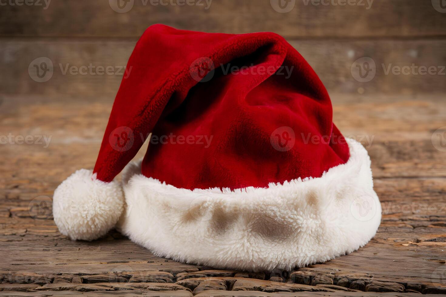 Santa hat tilted on rustic wood, cozy holiday vibe photo