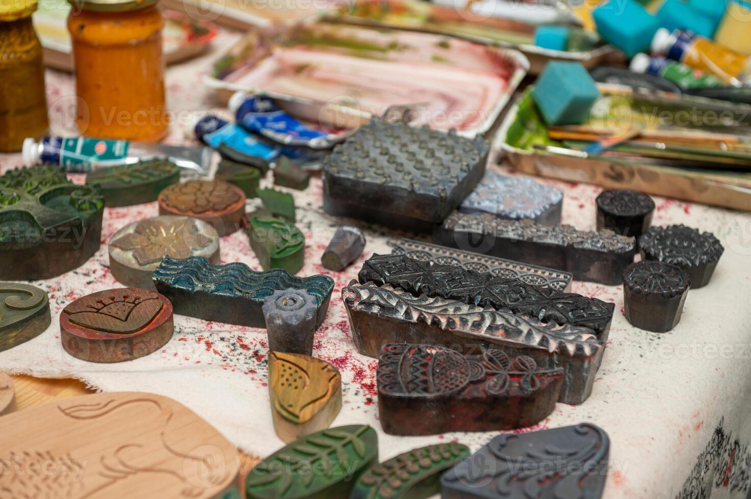 Intricate wooden and metal stamps for artistic block printing photo