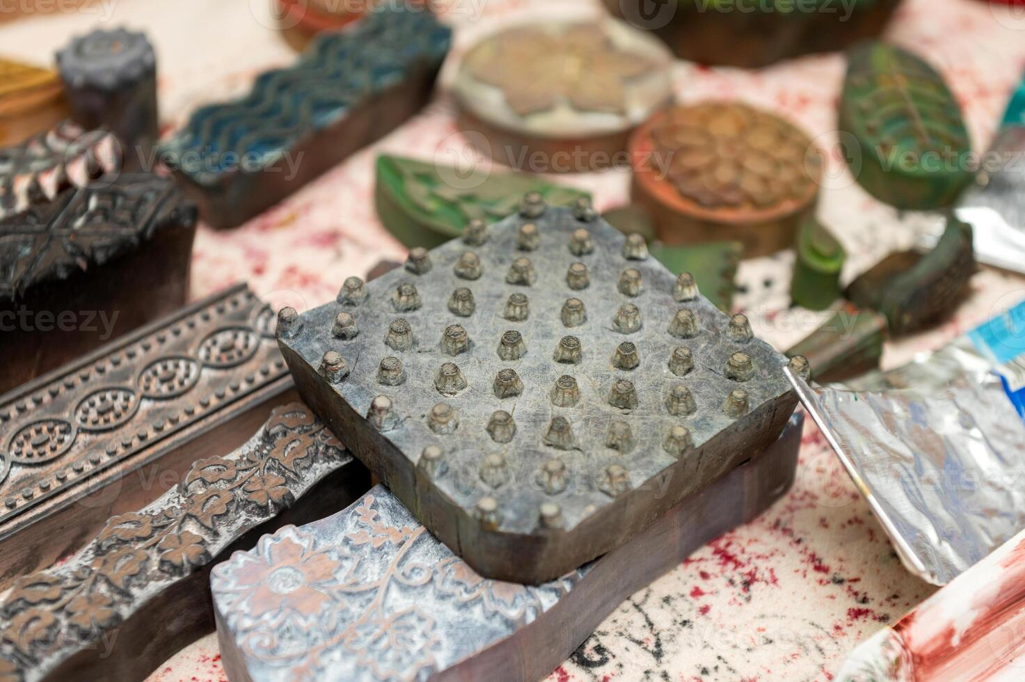 Intricately carved wooden printing blocks for textile and craft designs photo