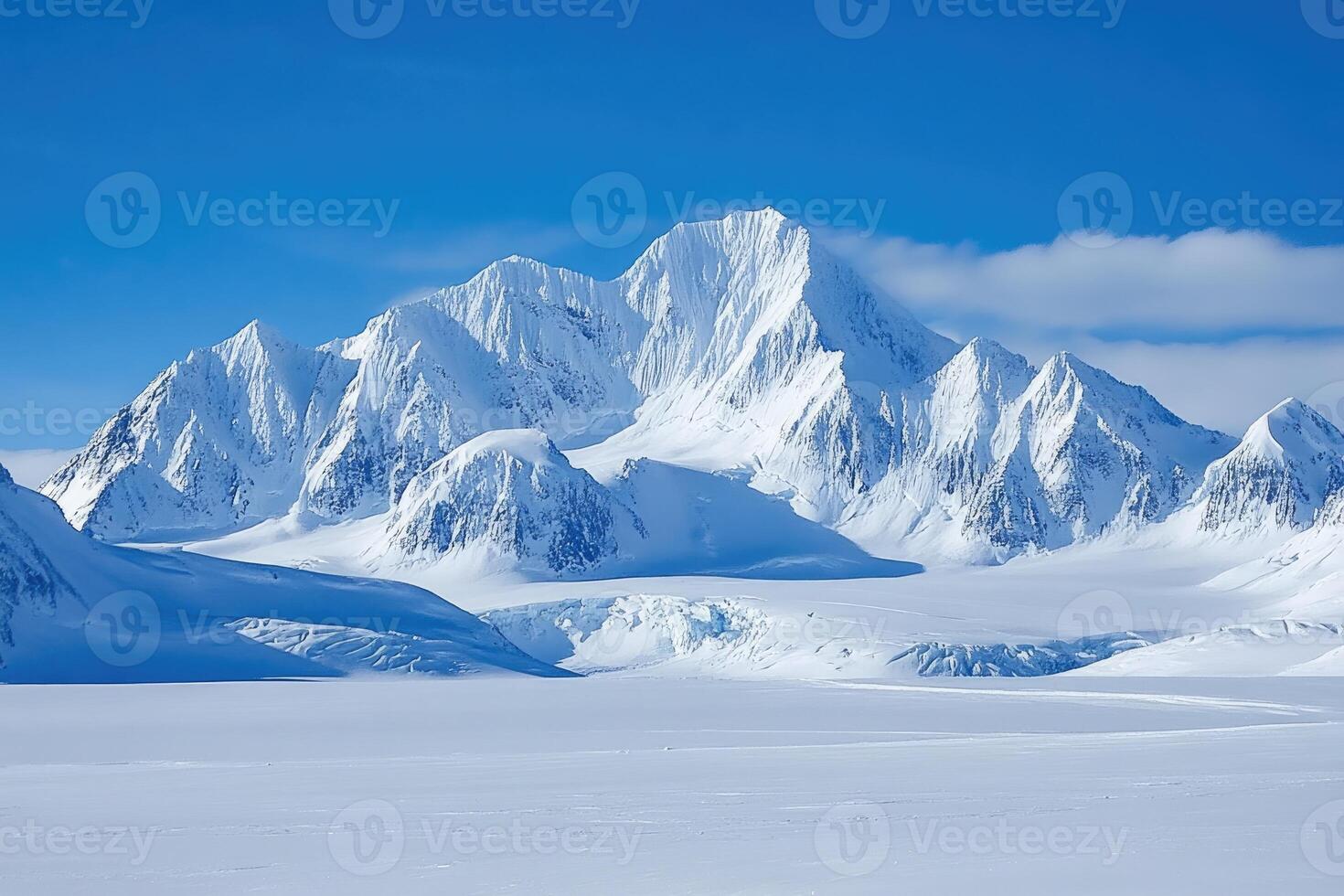 Mount everest emerging from a sea of clouds under a clear blue sky photo