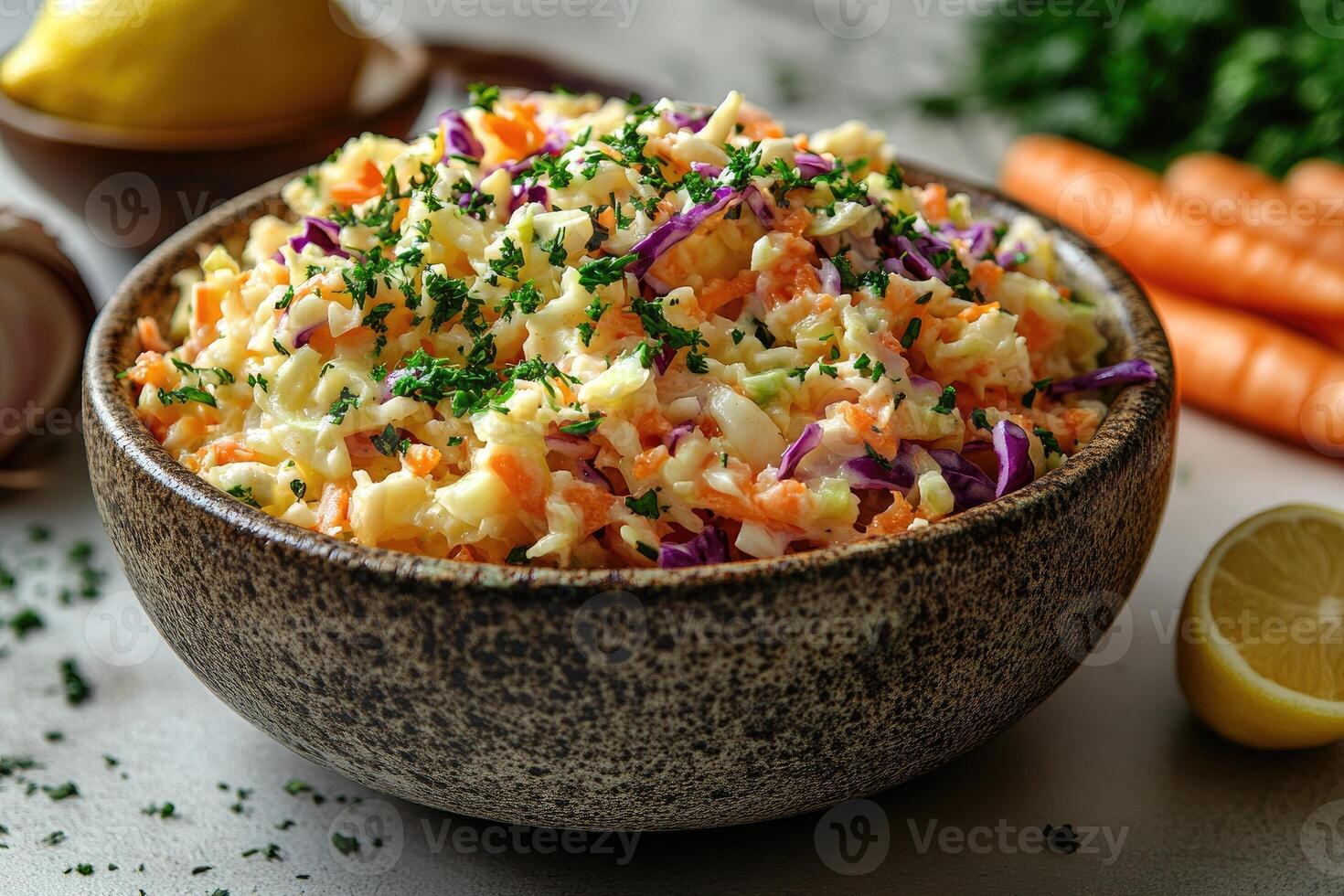 Coleslaw salad with cabbage, carrot, mayonnaise, and parsley topping in rustic bowl photo