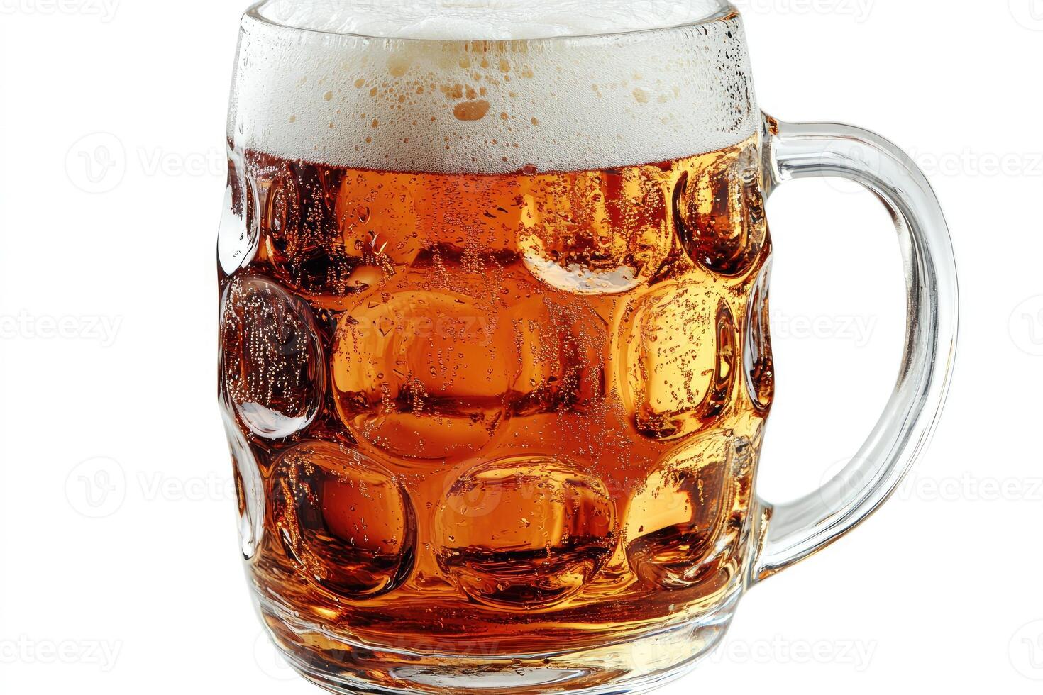Large beer mug full of refreshing amber lager with foam head photo
