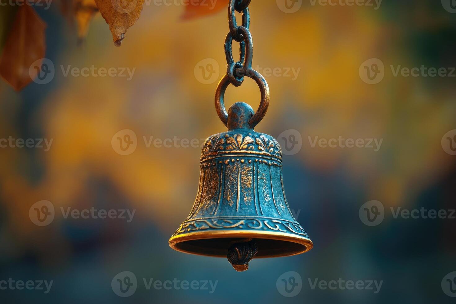 Small bell hanging on a chain creating a relaxing atmosphere photo