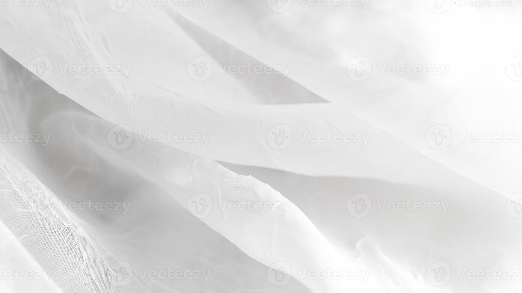 Romantic white veil background with airy layers and soft elegant textures. photo