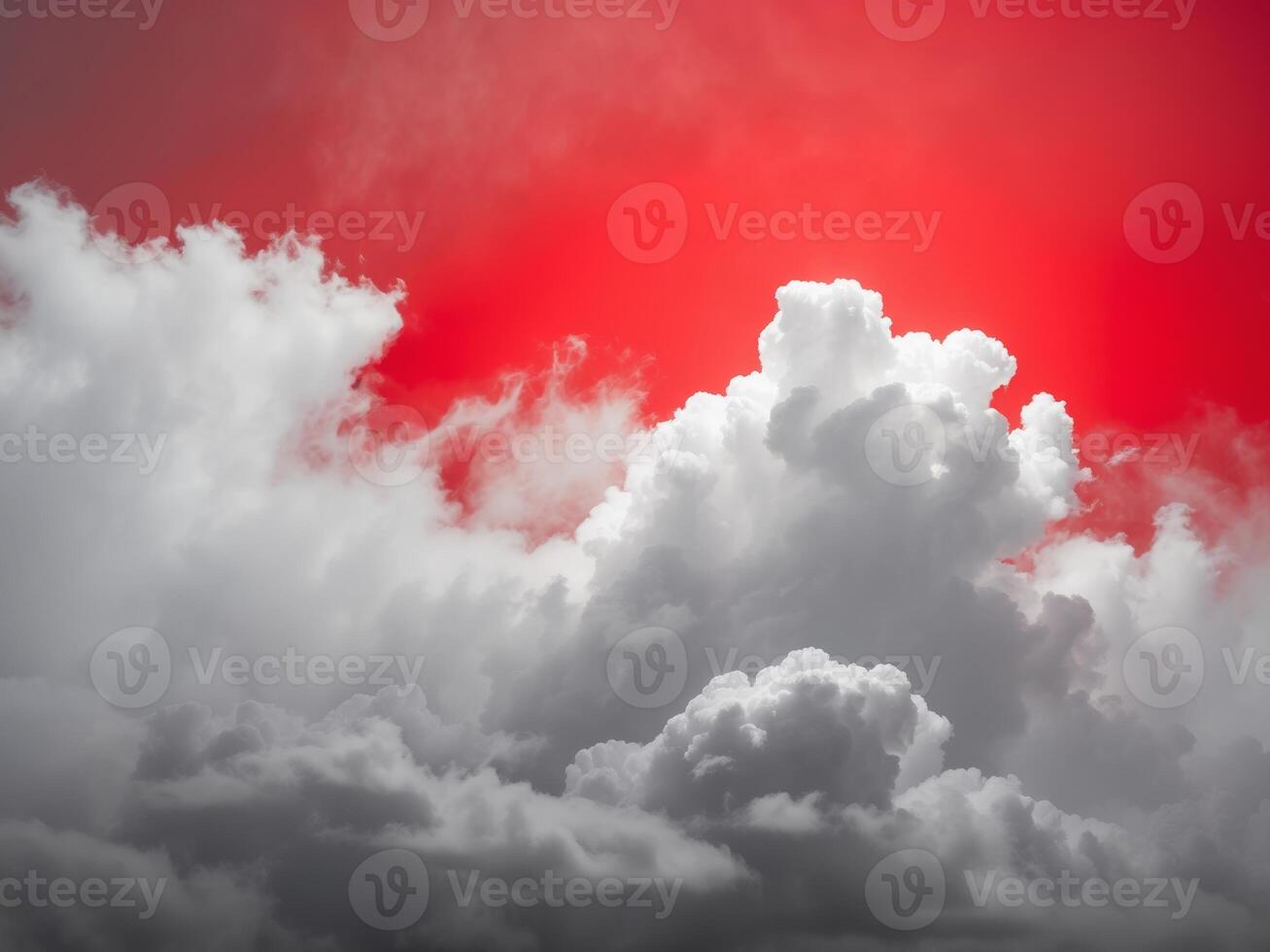 A red sky with clouds and a bright sun photo