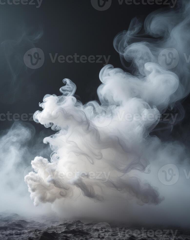 A white cloud of smoke is blowing in the air photo