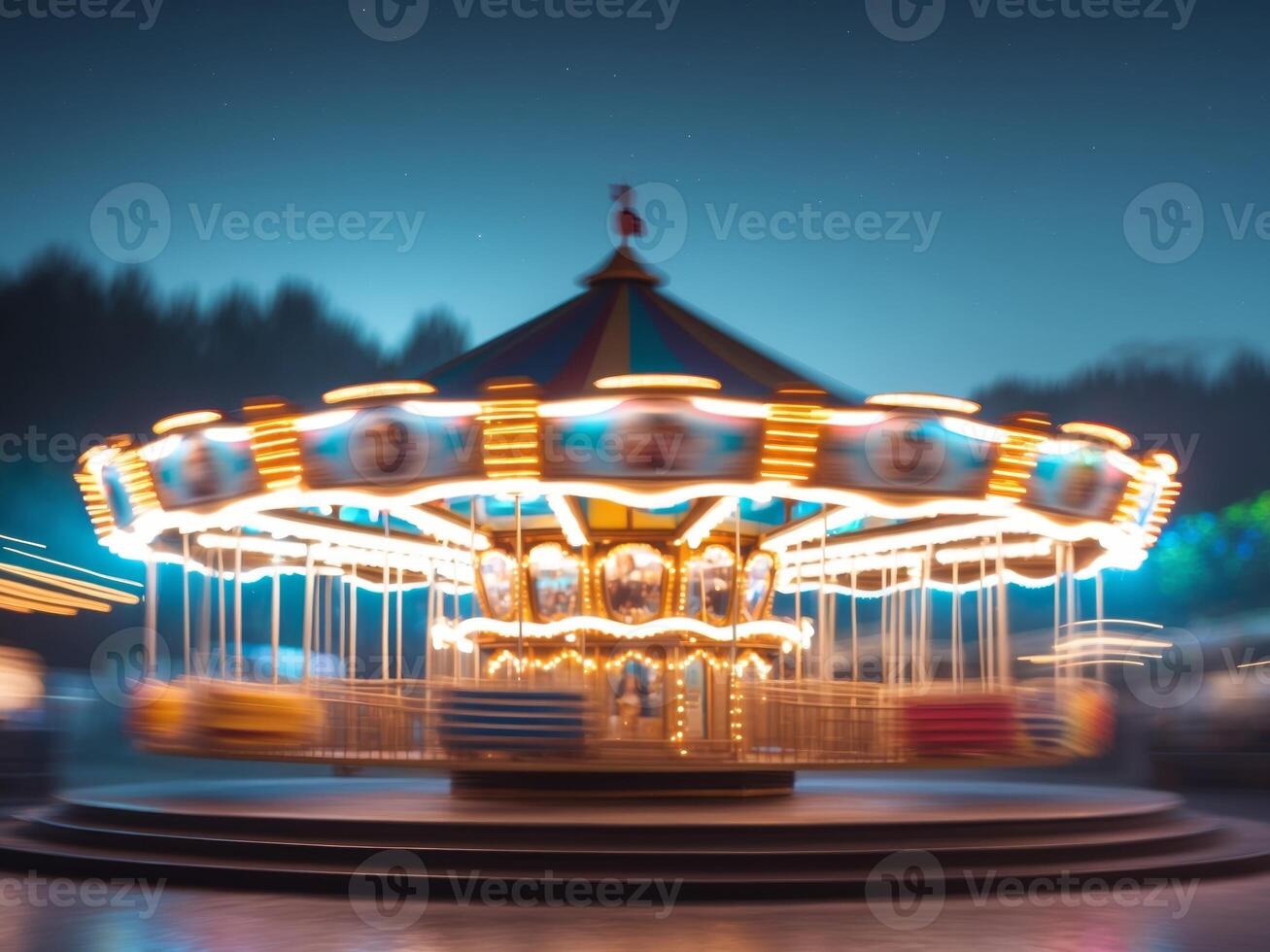 A blurry image of a carousel at night photo