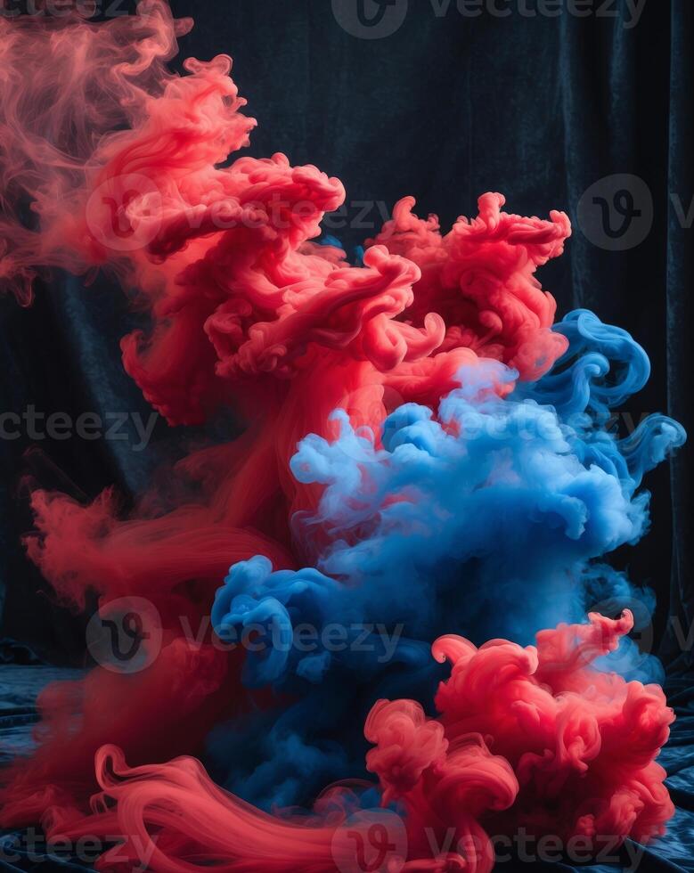 Vibrant swirls of red and blue smoke on black background photo