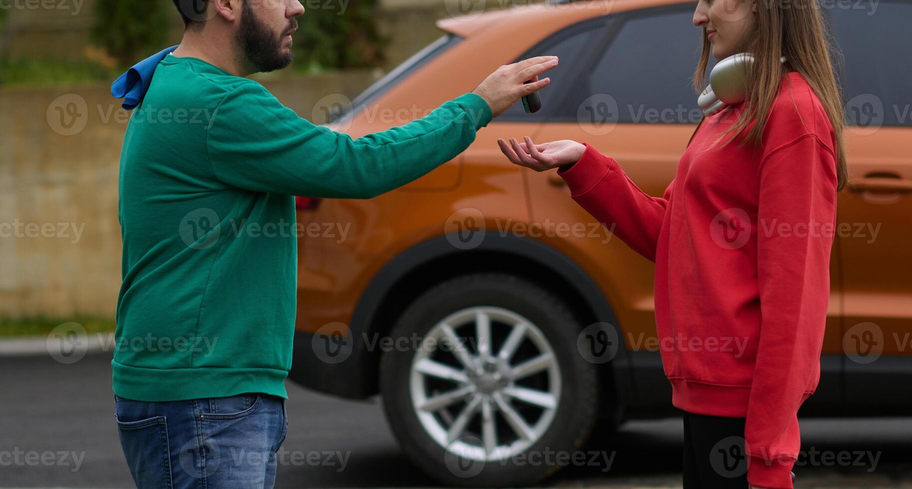 Car keys handshake, seller or car salesman and customer in a dealership, shake hands over the car keys photo