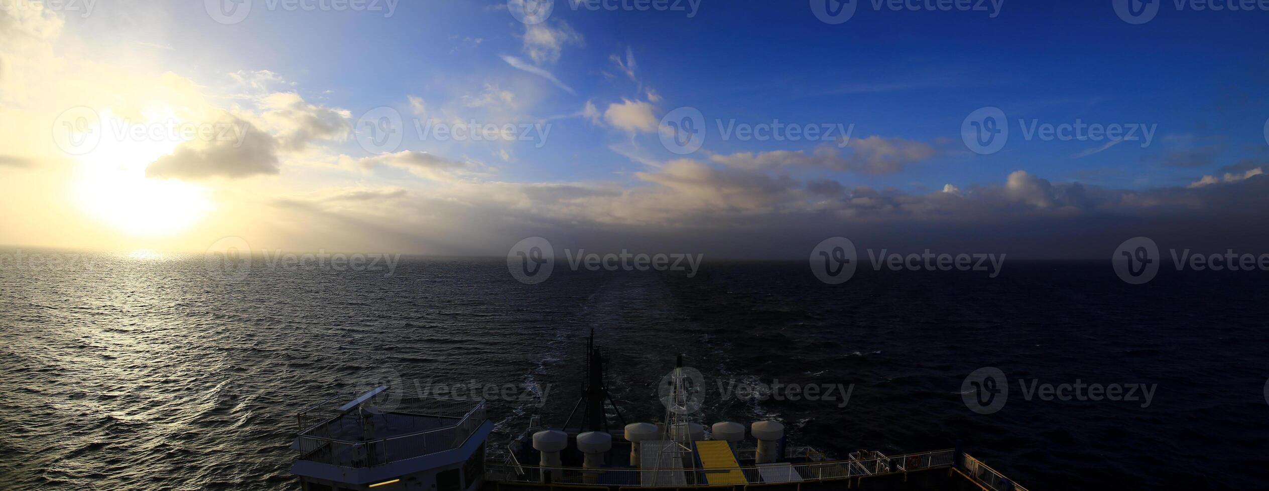 Panorama taken from the back of a ferry on the Baltic Sea photo