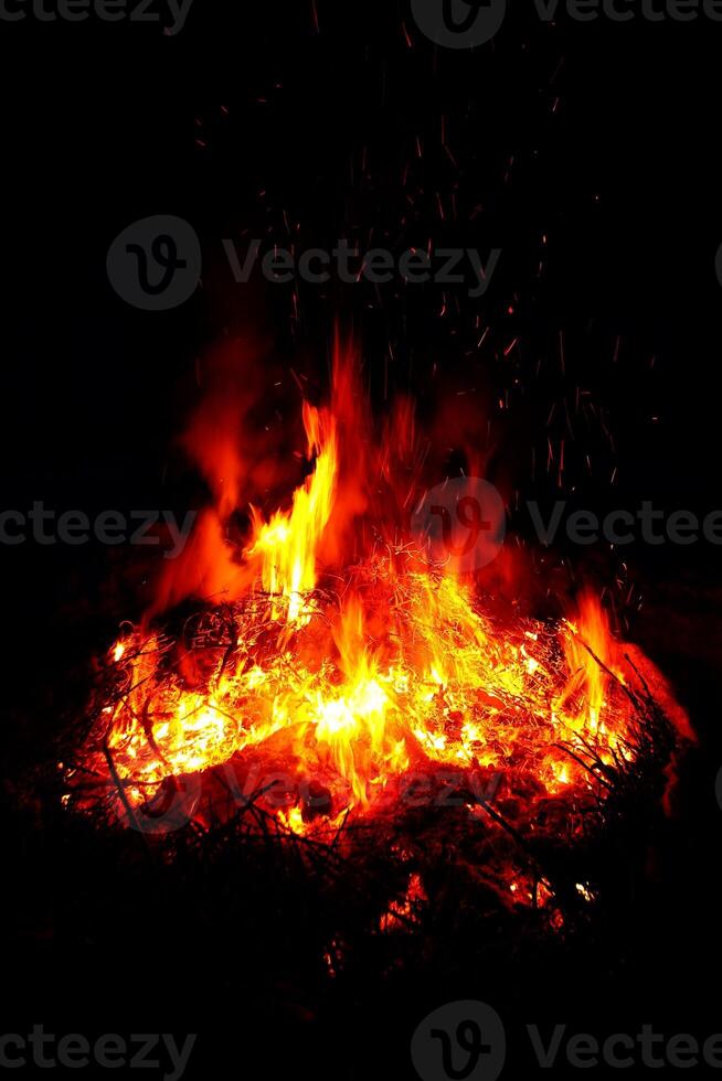 Dark detail shot of fire and glow photo