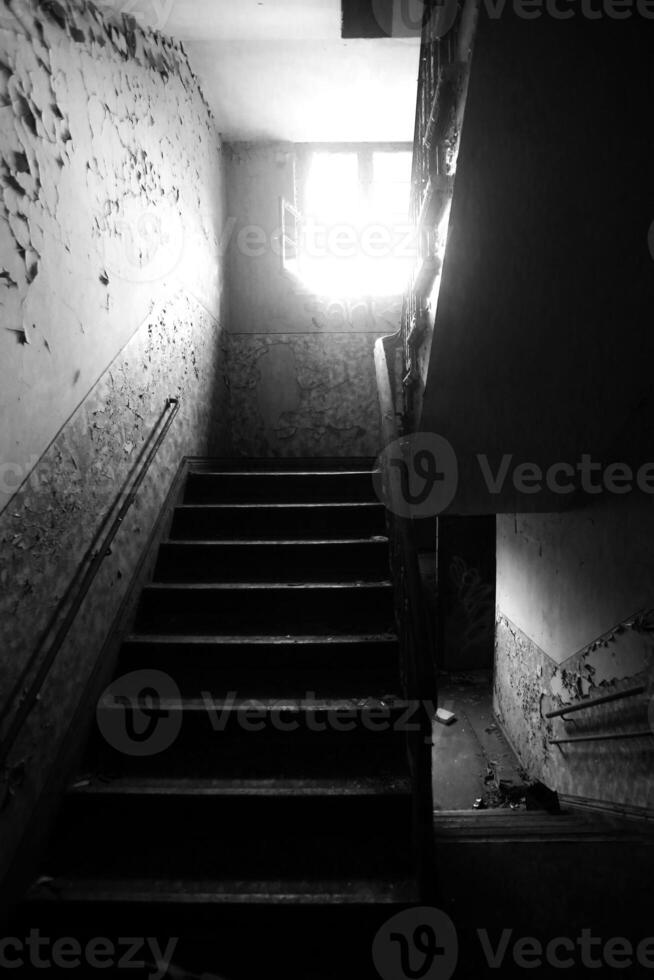 Black and white image of destroyed staircase photo