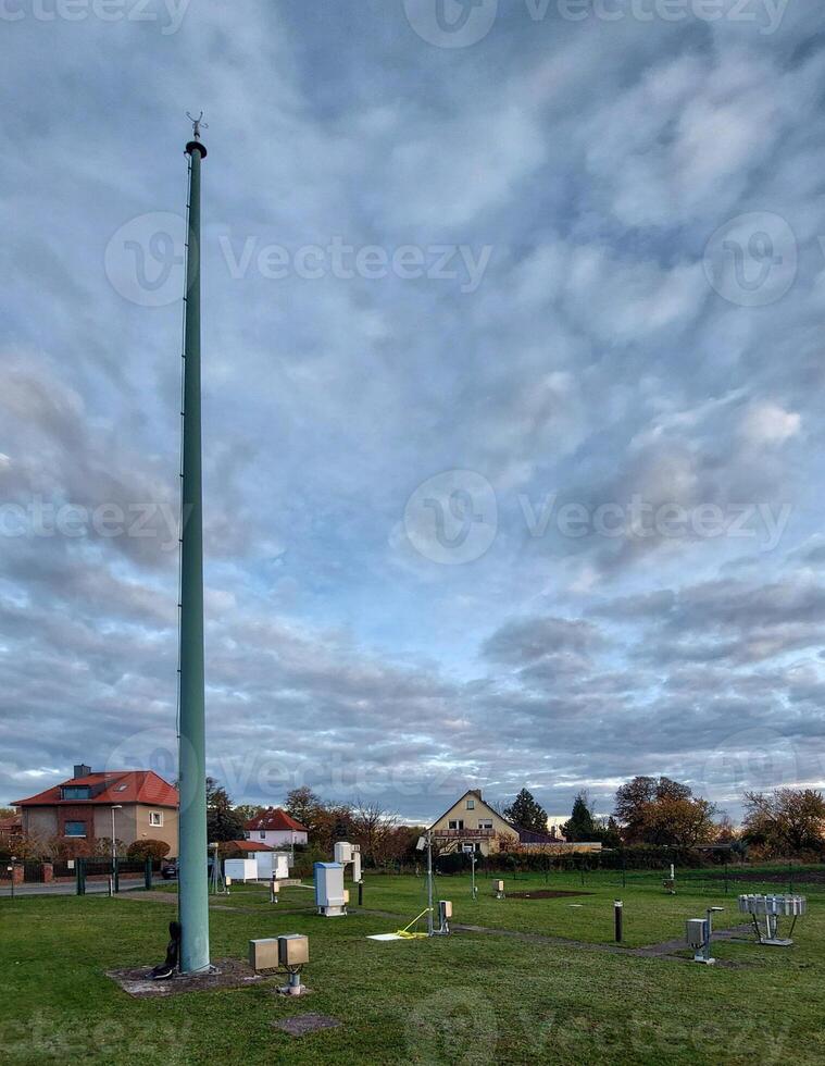 Weather station in Germany with a mast and various instruments photo