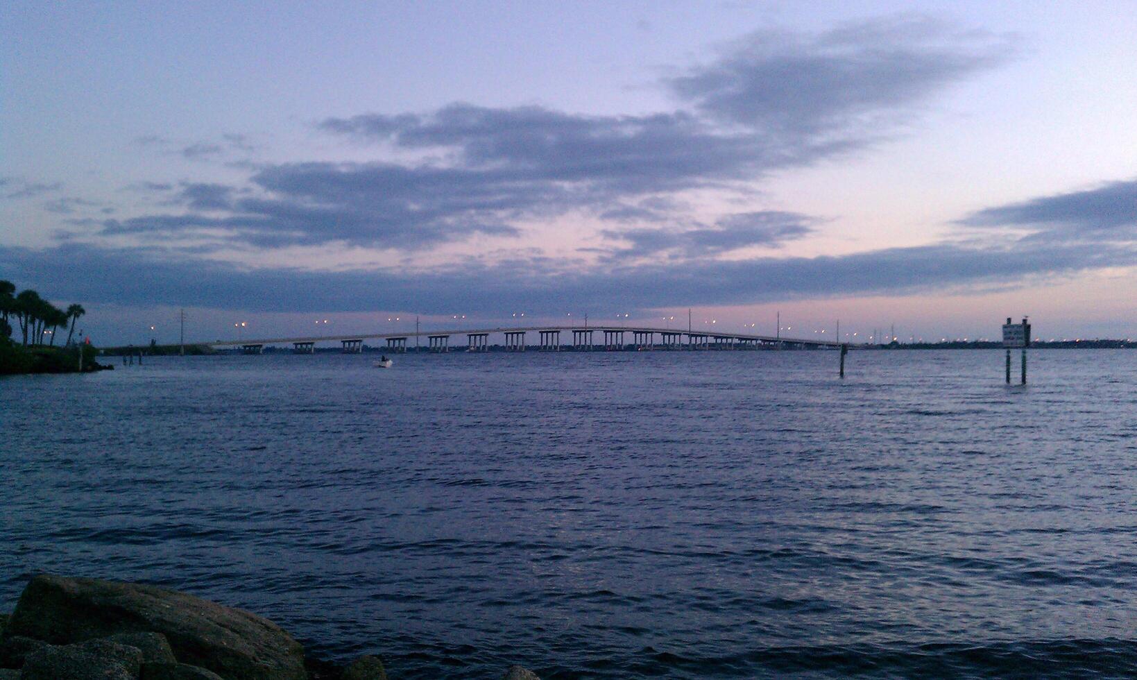 A bridge over a body of water photo