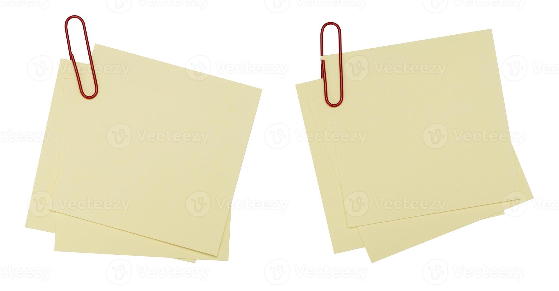 Blank post it note with green paper clip isolated on white. photo