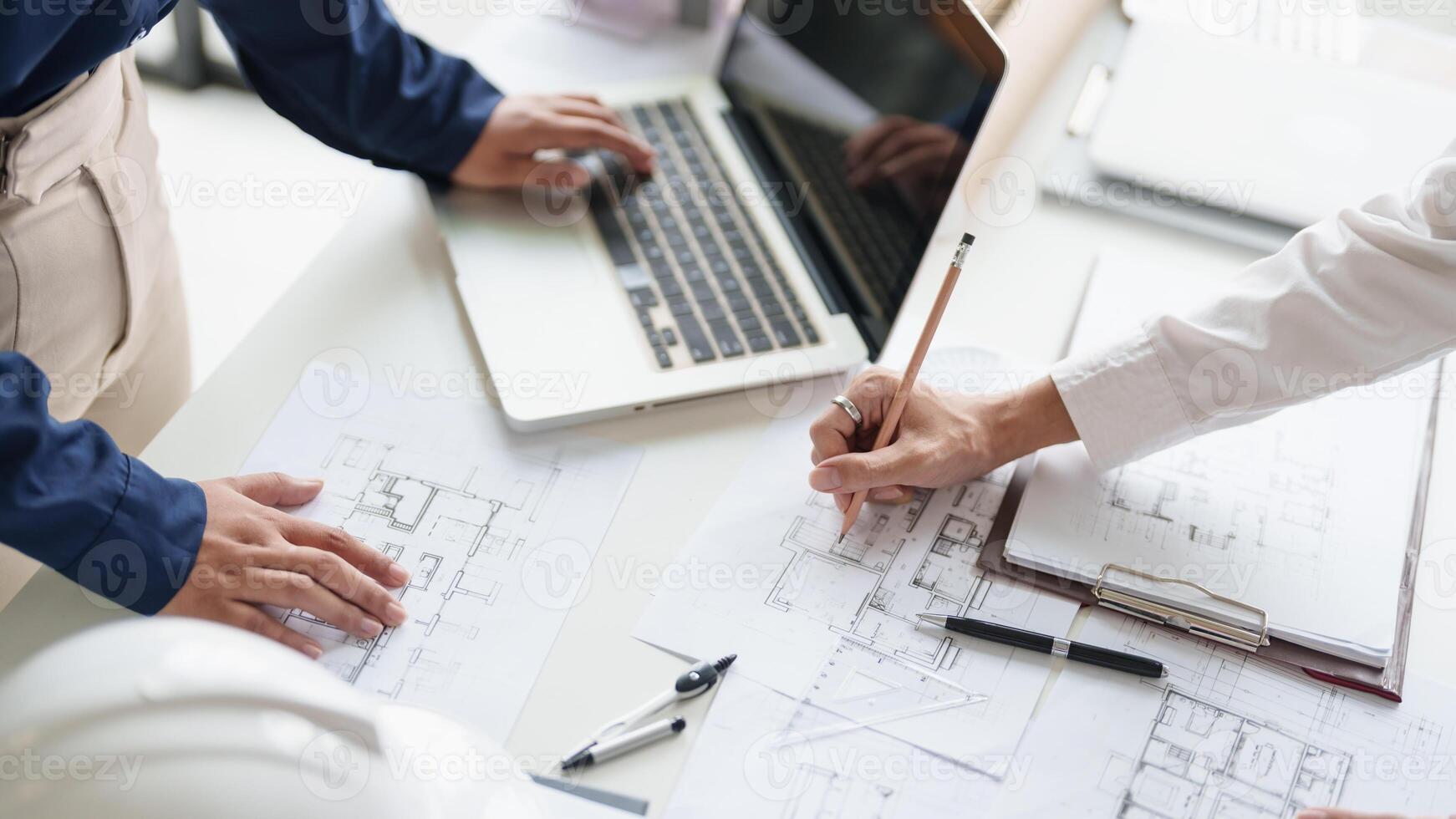 Architecture drawing on architectural project business architecture building construction Colleagues designer Planning Design on blueprint and compasses photo