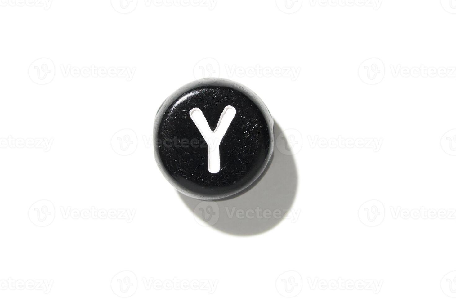 Minimalist black keyboard button with letter y on white background - symbol for technology and communication photo