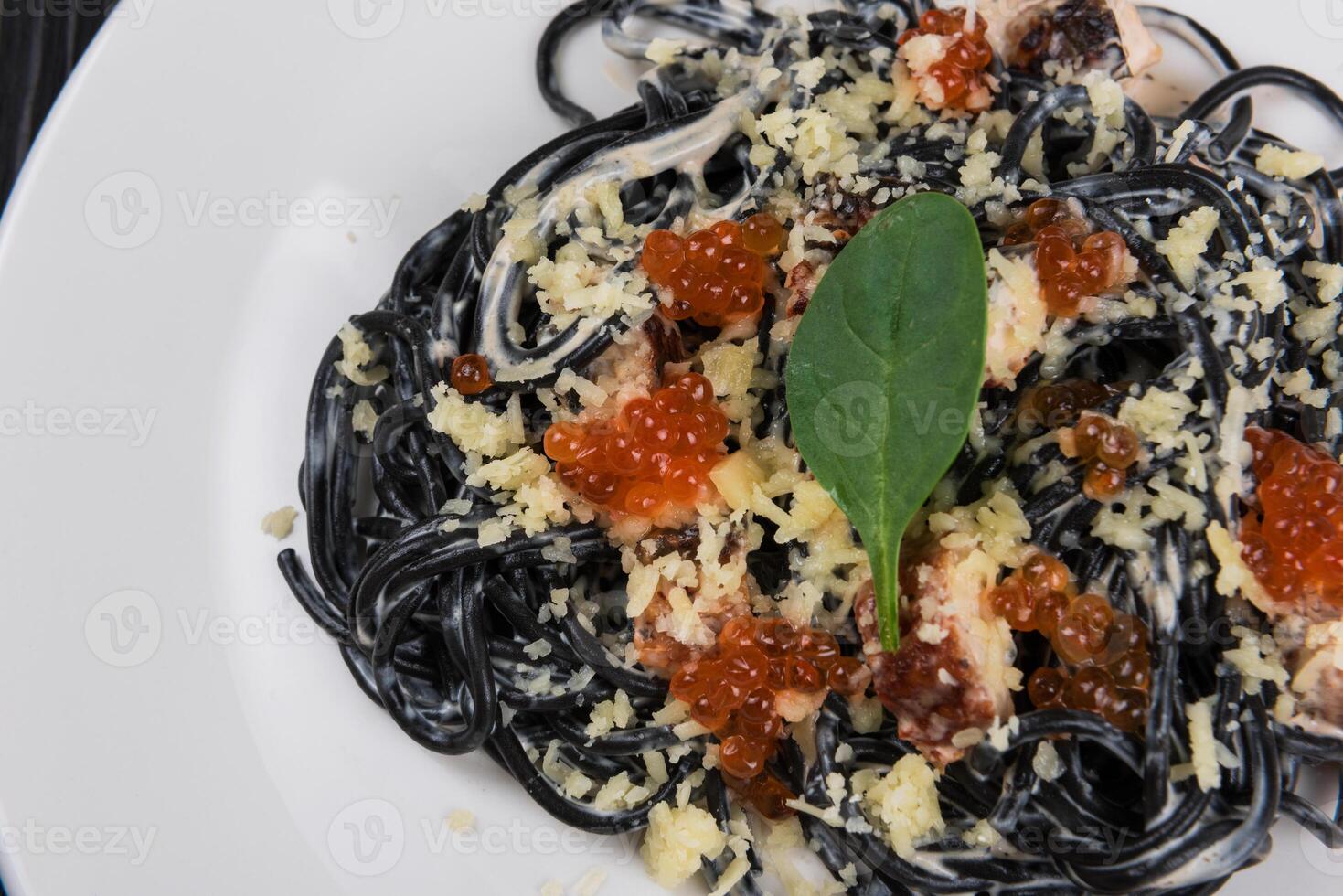 Black pasta with cuttlefish ink photo