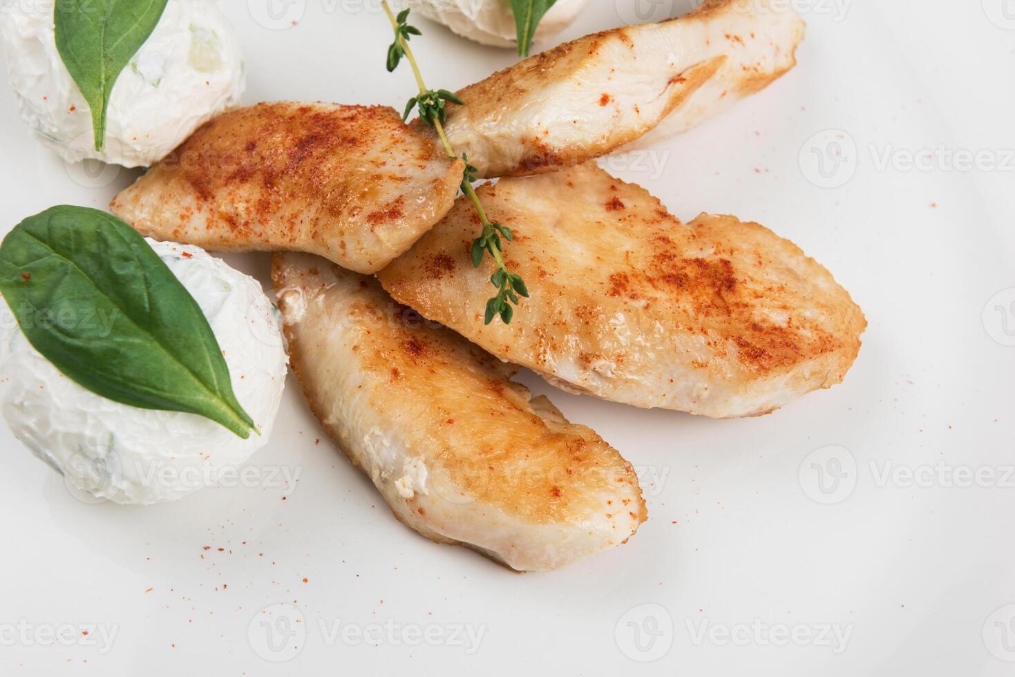 Grilled chicken breast with mozzarella cheese. photo