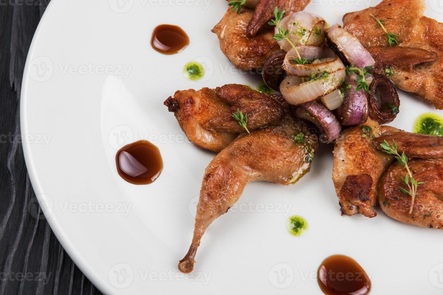 Baked quails with vegetable photo
