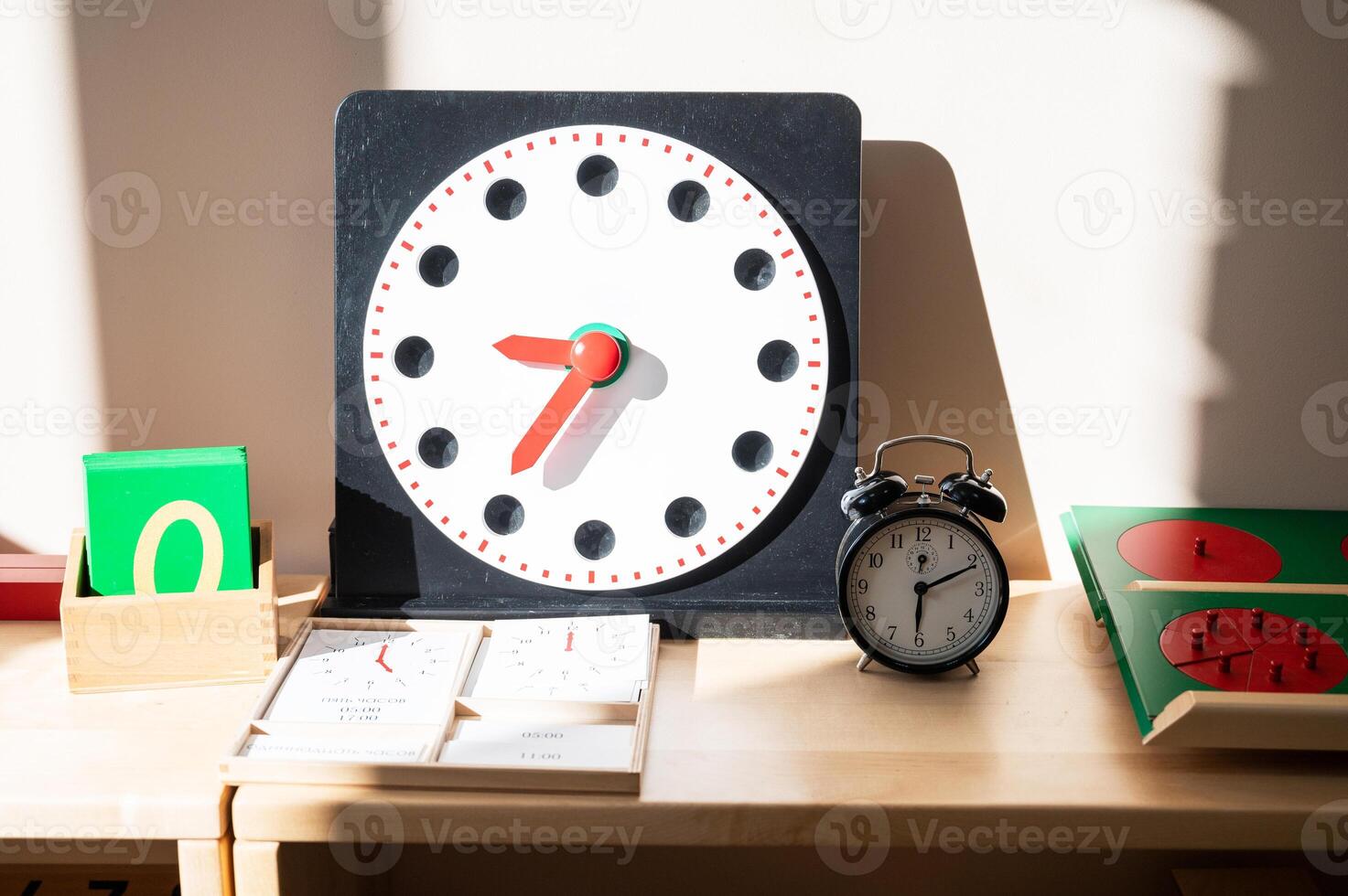 Wooden Clock toy for Montessori Learning photo