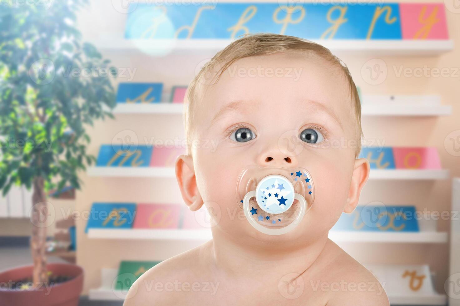 Baby with Pacifier in Bright Classroom Setting photo