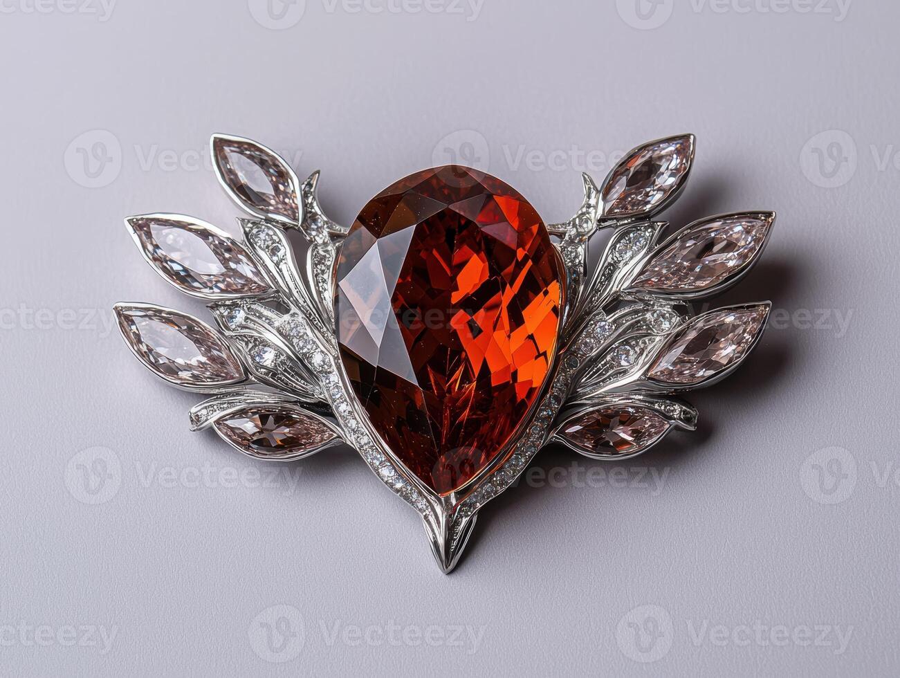Elegant orange gemstone and diamond brooch photo