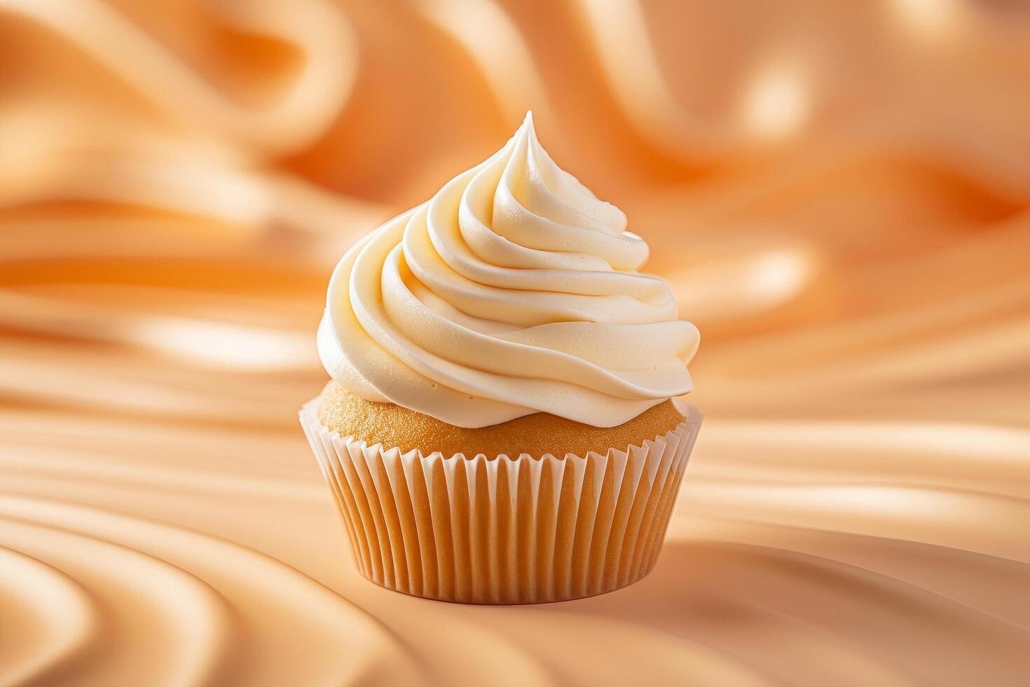 Delicious creamy cupcake with swirled frosting photo