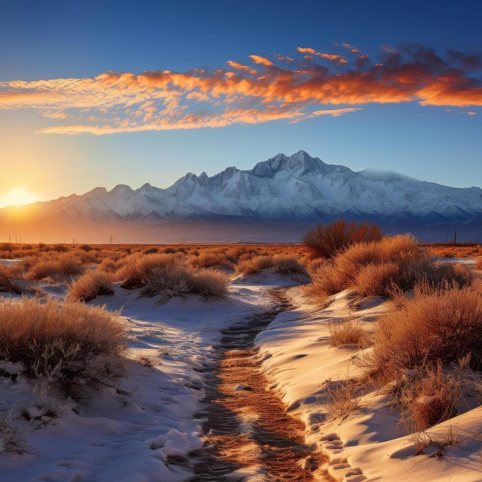 Snowy mountain landscape at sunset photo
