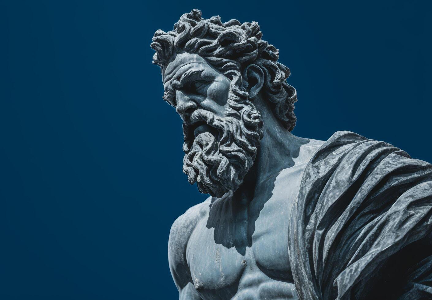 Dramatic statue of a bearded figure photo