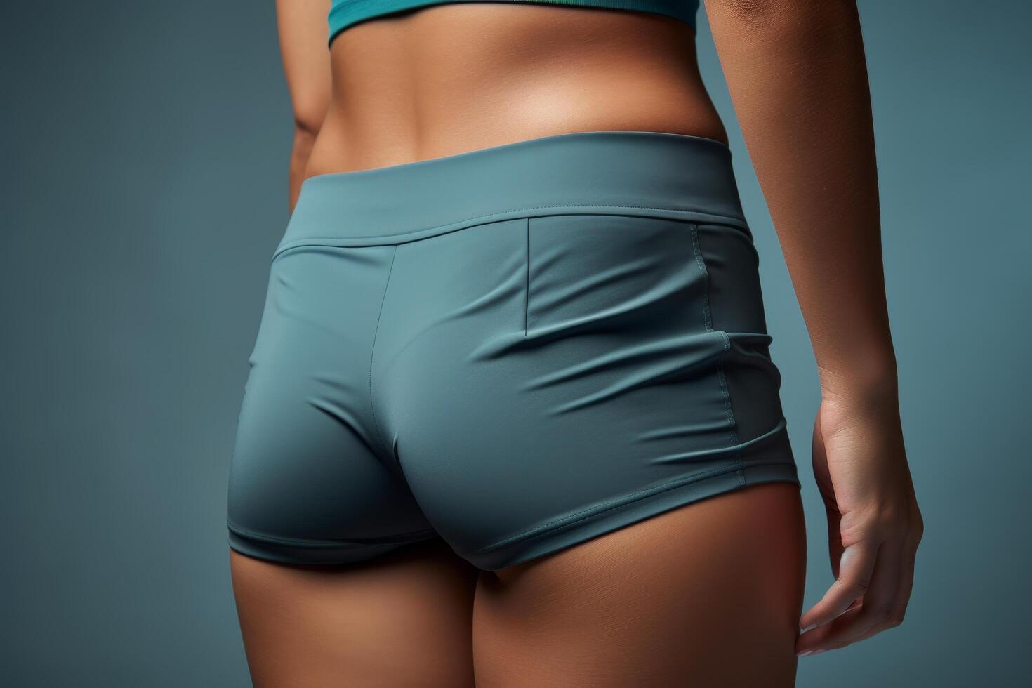 Fit womans midsection in workout clothes photo